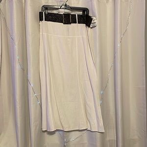 Size L cream colored maxi skirt with brown belt.